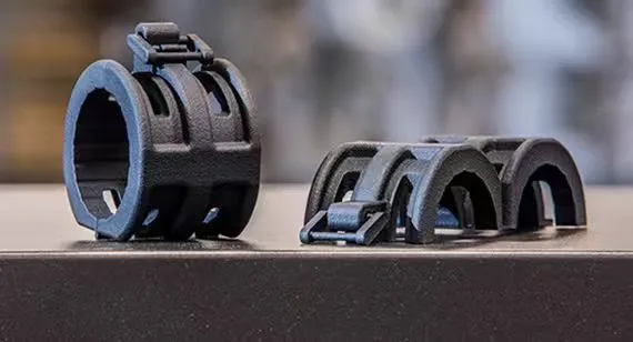 SLS Design Guide: Wall Thickness, Hole Diameter, Tolerances, and Living Hinges SLS selective laser sintering printed nylon living hinge flexible structure model demonstration